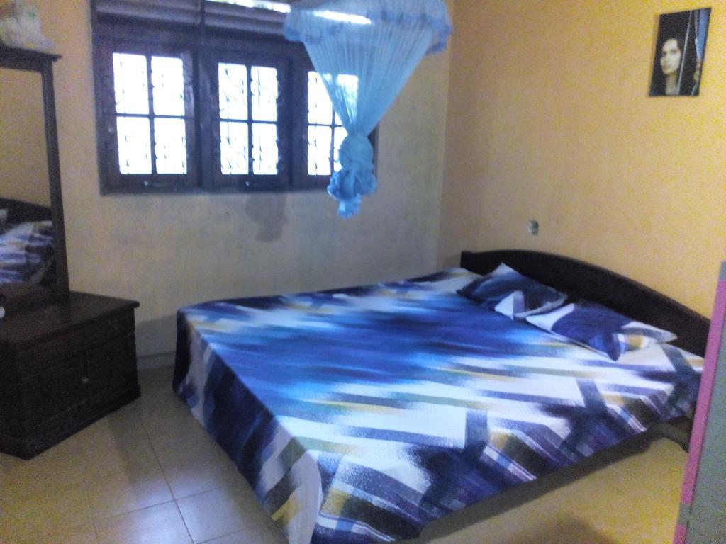 Smart Holiday Inn كالي الغرفة الصورة