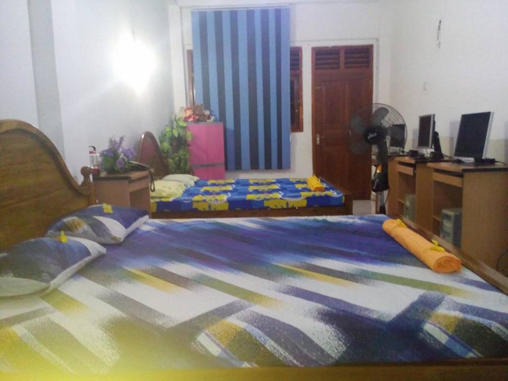 Smart Holiday Inn كالي الغرفة الصورة