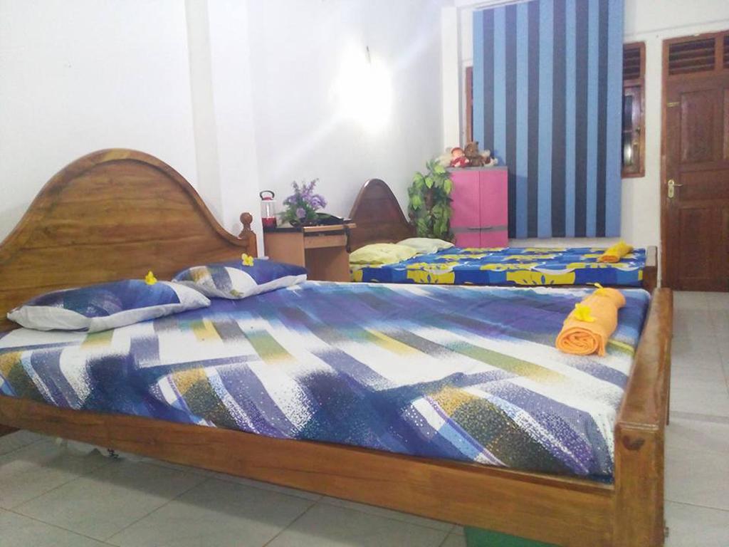 Smart Holiday Inn كالي المظهر الخارجي الصورة