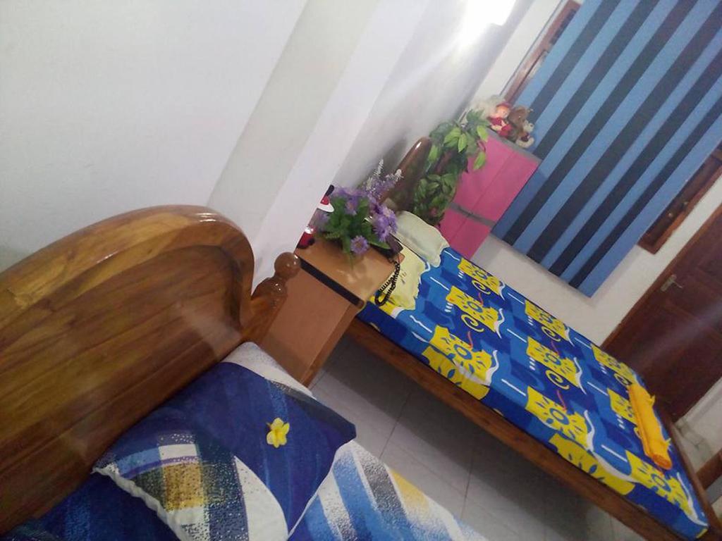 Smart Holiday Inn كالي الغرفة الصورة