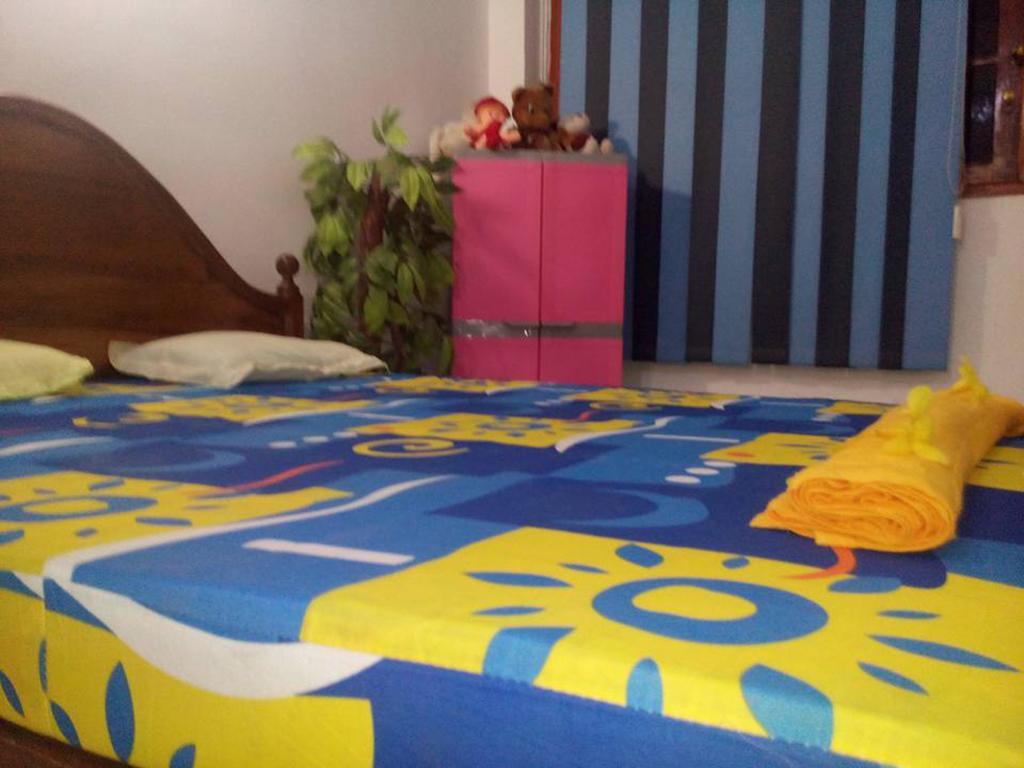 Smart Holiday Inn كالي الغرفة الصورة