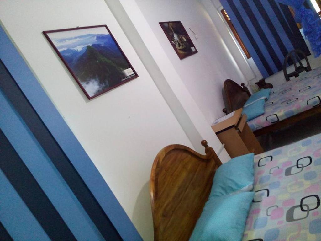 Smart Holiday Inn كالي الغرفة الصورة